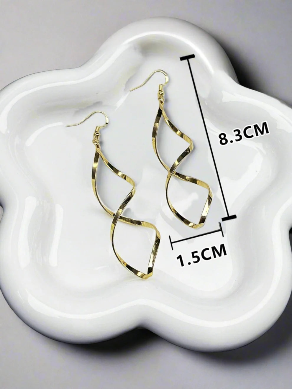 Wave dangle shape Earrings for women Material:- Alloy Zinc