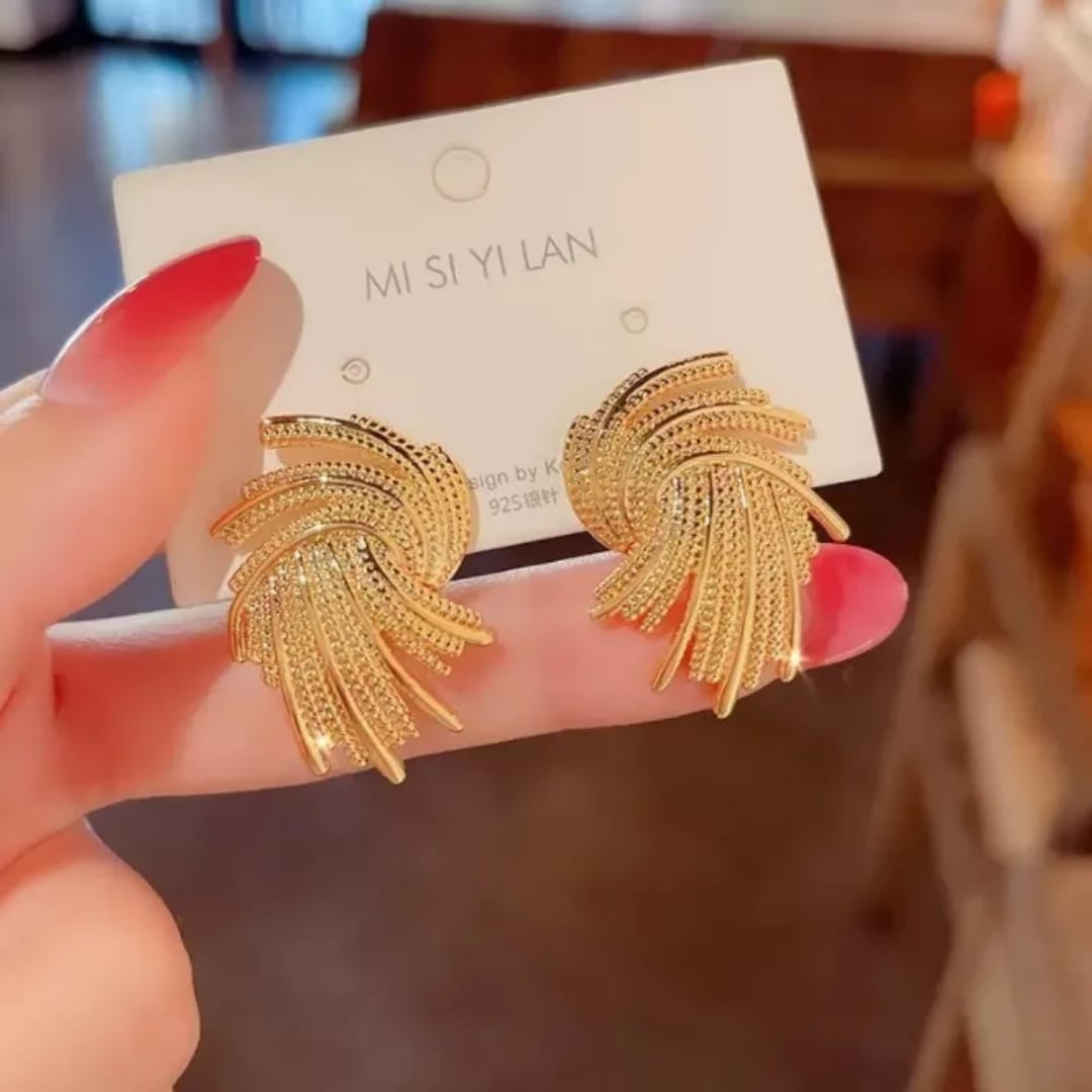 Stainless steel earrings , trending design Colour:- GoldAnti tarnish and Anti allergic 18 k gold plating Superior quality jewellery