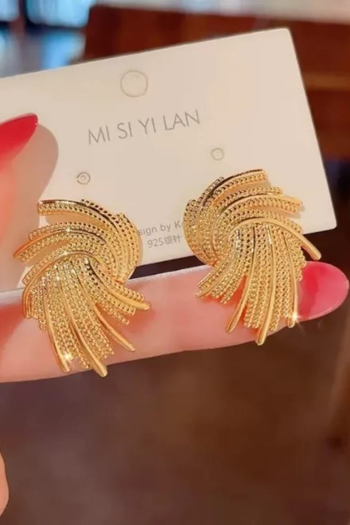 Stainless steel earrings , trending design Colour:- GoldAnti tarnish and Anti allergic 18 k gold plating Superior quality jewellery