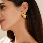 Stainless steel earrings , trending design Colour:- GoldAnti tarnish and Anti allergic 18 k gold plating Superior quality jewellery
