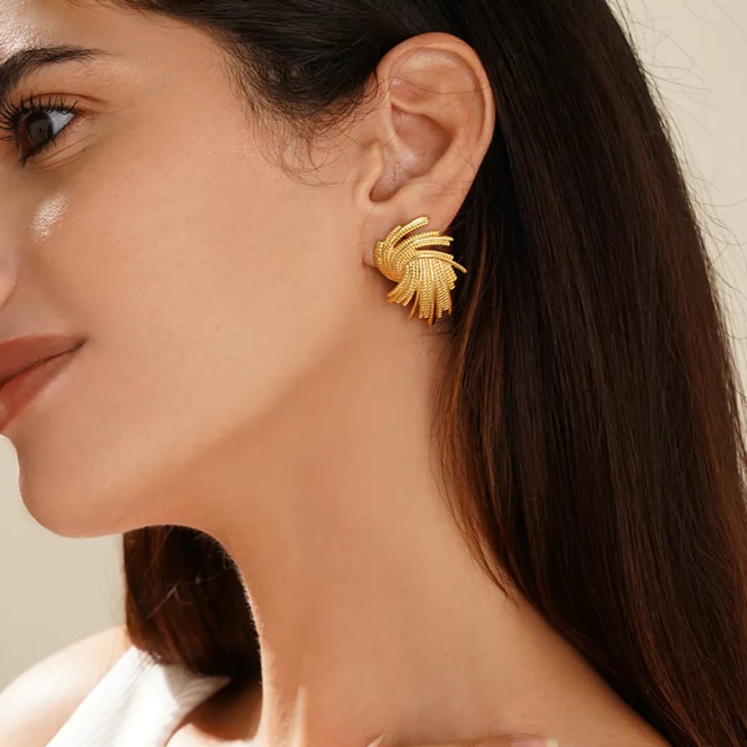 Stainless steel earrings , trending design Colour:- GoldAnti tarnish and Anti allergic 18 k gold plating Superior quality jewellery