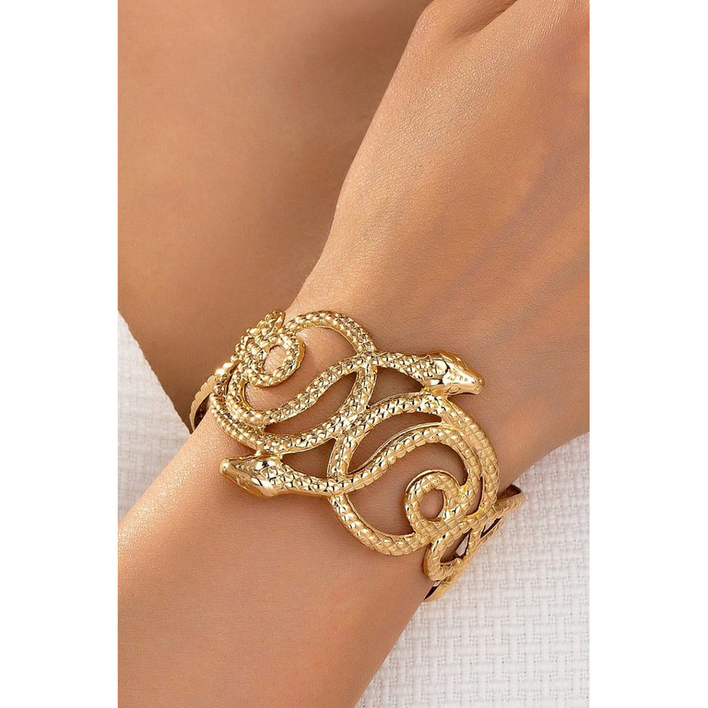 Snake bracelet for Women Colour:- Gold Material:- Stainless steel and copper mix Anti tarnish material