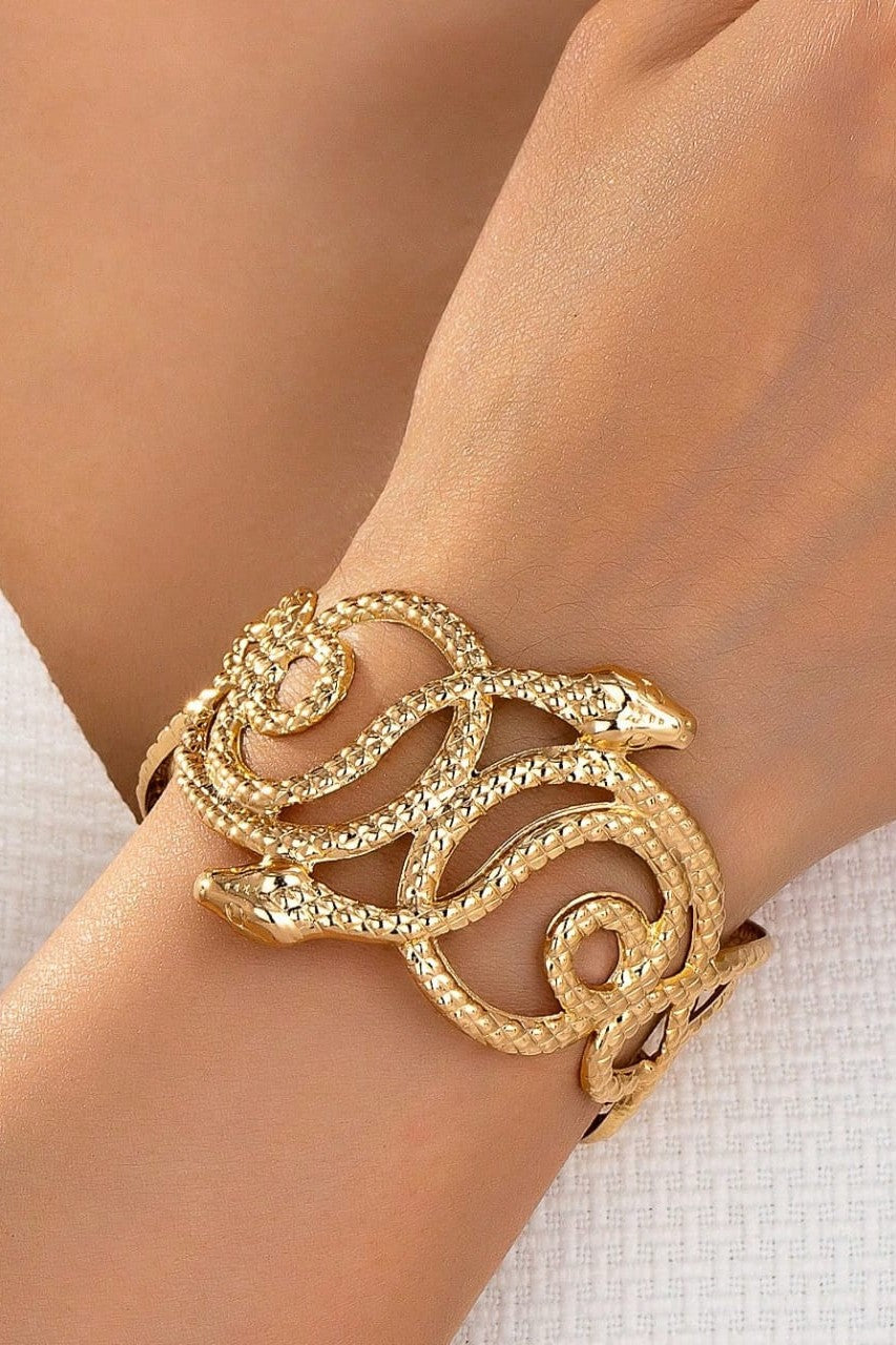 Snake bracelet for Women Colour:- Gold Material:- Stainless steel and copper mix Anti tarnish material