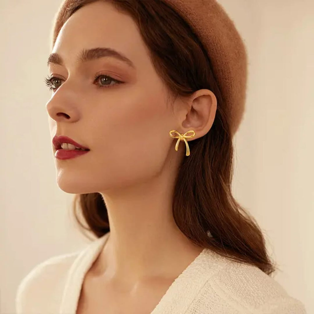 Stainless steel bow shape Earrings Anti tarnish and Anti Allergic 18 k gold plated Superior quality products