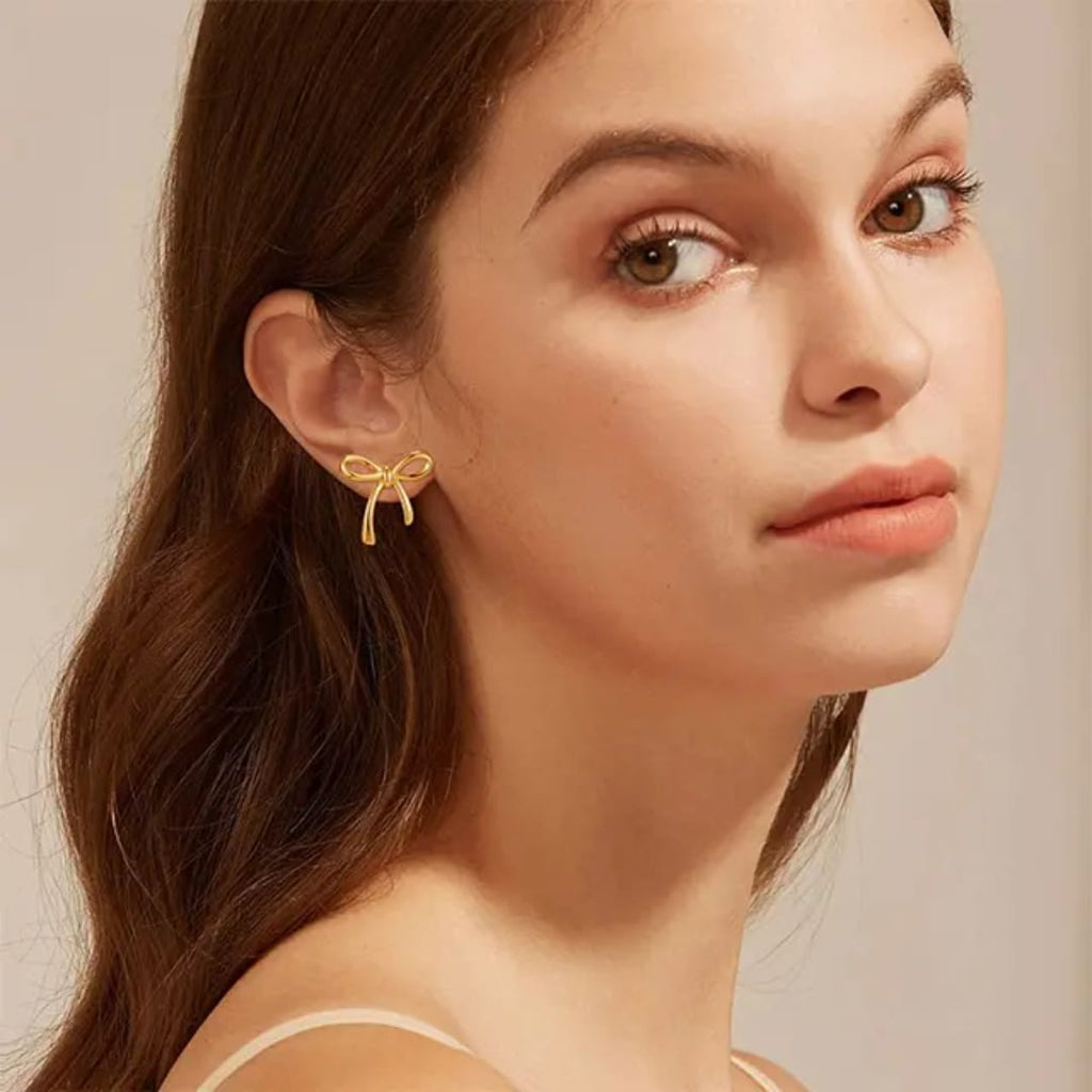 Stainless steel bow shape Earrings Anti tarnish and Anti Allergic 18 k gold plated Superior quality products