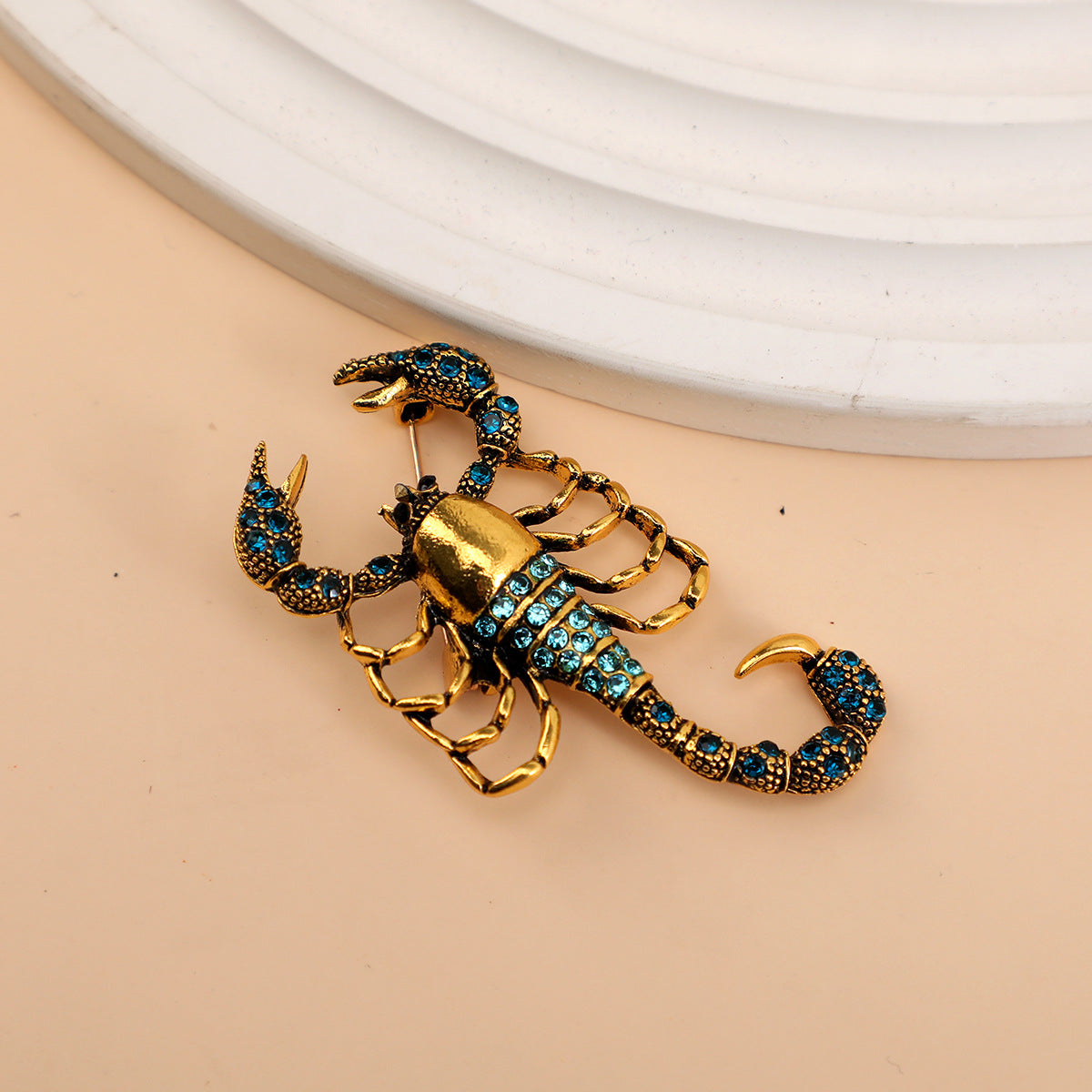 Scorpion shaped Brooch Unisex style for men and women bothAnti tarnished material Colour:- Same as photo Material:- Alloy copper