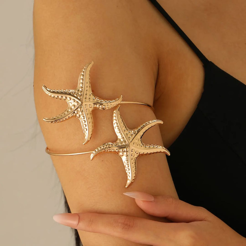 Starfish shaped Armlet for women Colour:- Gold Material:- Alloy Copper Superior Quality, Anti tarnish material