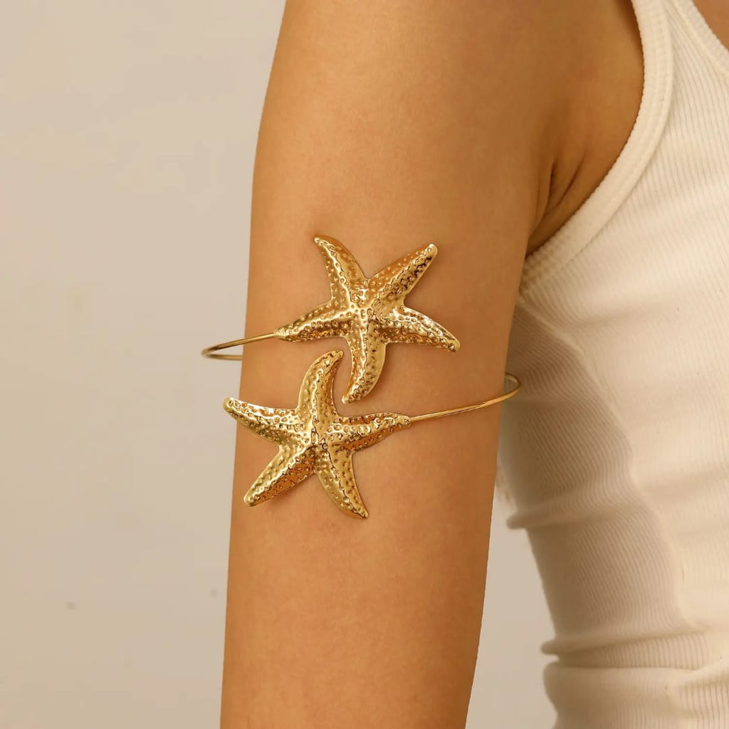 Starfish shaped Armlet for women Colour:- Gold Material:- Alloy Copper Superior Quality, Anti tarnish material
