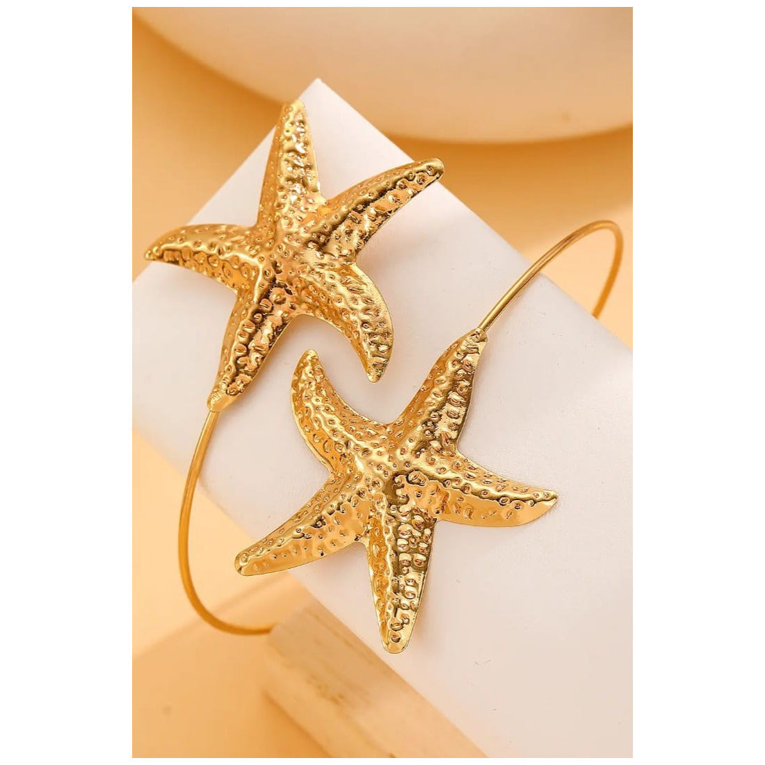 Starfish shaped Armlet for women Colour:- Gold Material:- Alloy Copper Superior Quality, Anti tarnish material