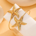 Starfish shaped Armlet for women Colour:- Gold Material:- Alloy Copper Superior Quality, Anti tarnish material