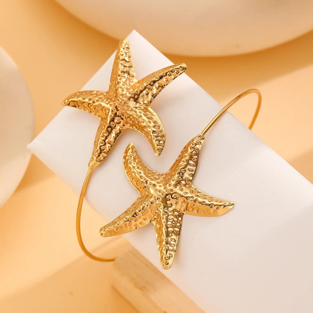 Starfish shaped Armlet for women Colour:- Gold Material:- Alloy Copper Superior Quality, Anti tarnish material