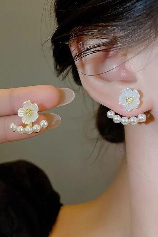 Pearl And Flower earringsExclusive launch designAnti tarnish materialMaterial:- Pearl  + Acrylic+ Alloy