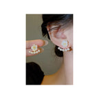 Pearl And Flower earringsExclusive launch designAnti tarnish materialMaterial:- Pearl  + Acrylic+ Alloy