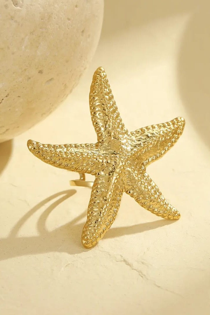 Stainless steel statement rings Starfish shaped Material:- Stainless steel with 18 k gold plated Anti tarnish and Anti Allergic Superior Quality products