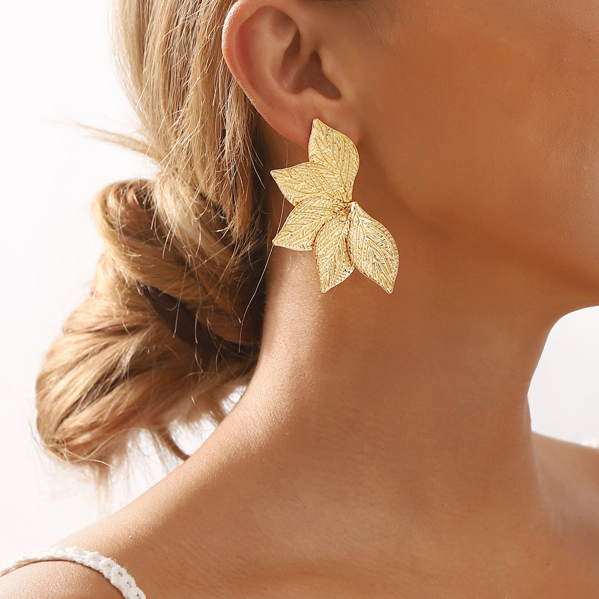Leafy earrings for women Big Size, Premium Quality Colour:- Gold Electroplating Material:- Zinc Pls check real video for better look