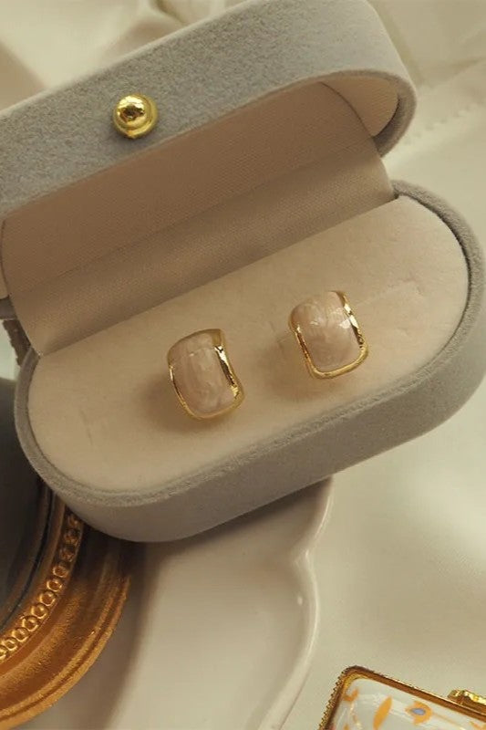 Trending creamy gold studs for women Colour:- Same as photoAnti tarnish earrings Material:- Copper