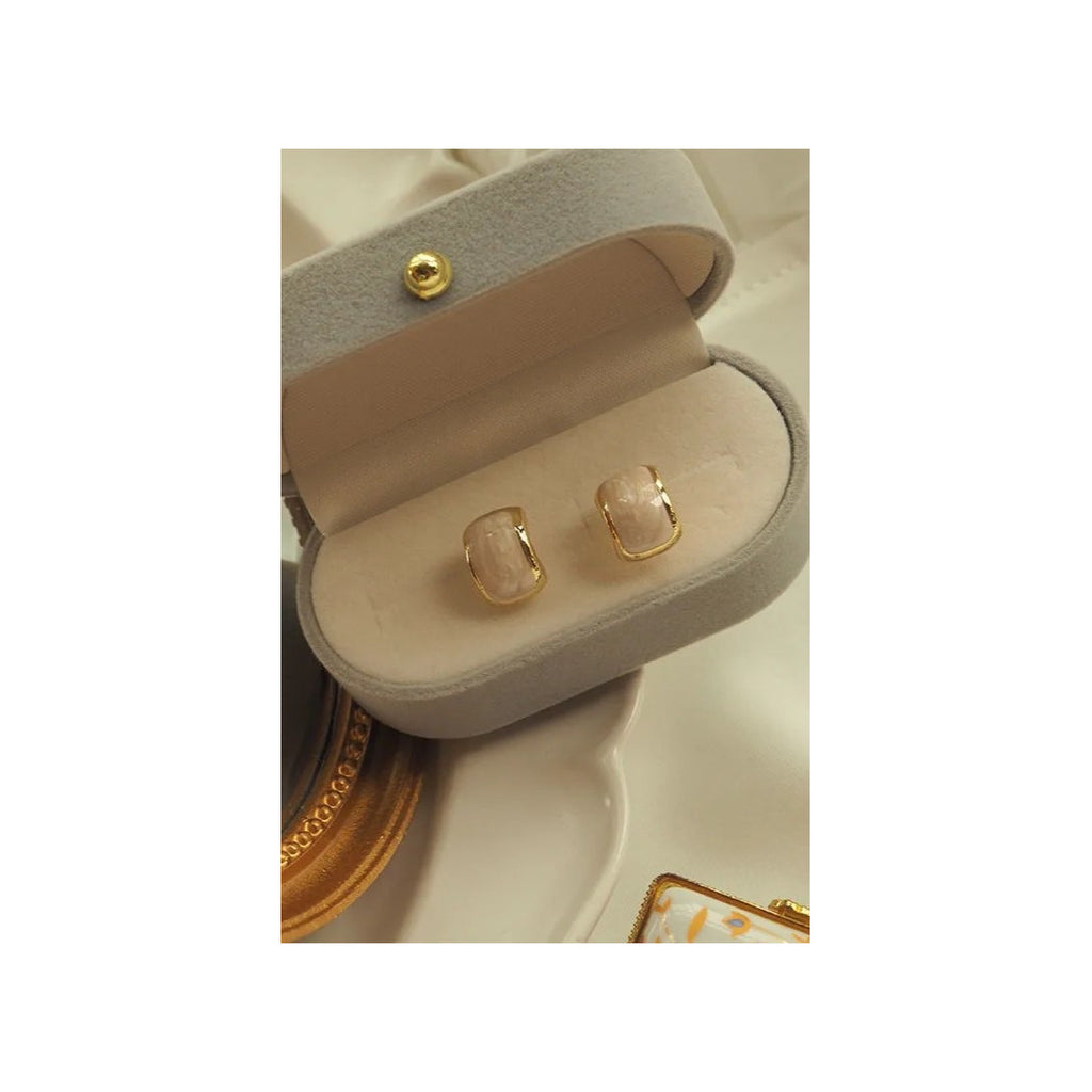 Trending creamy gold studs for women Colour:- Same as photoAnti tarnish earrings Material:- Copper