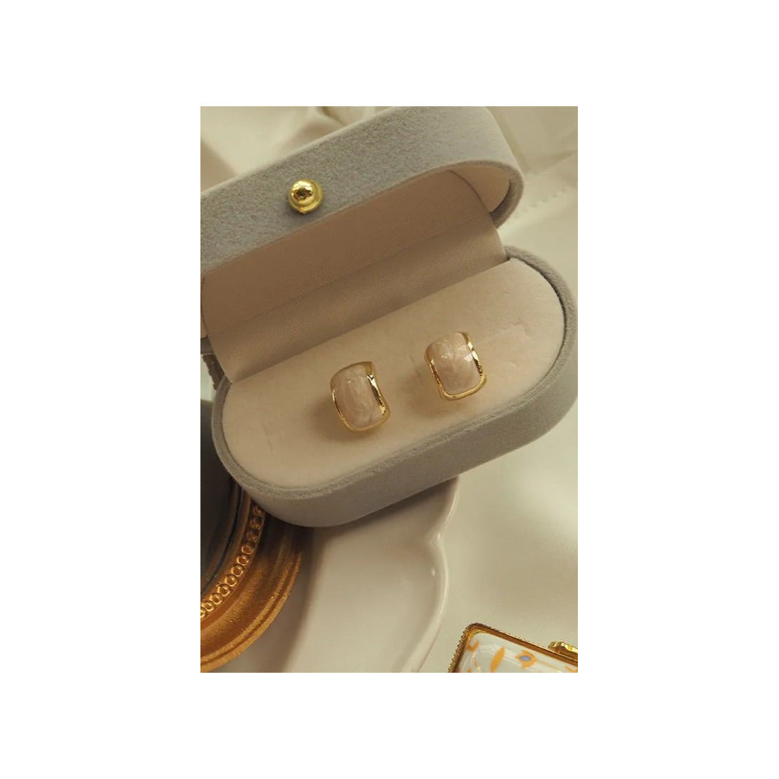 Trending creamy gold studs for women Colour:- Same as photoAnti tarnish earrings Material:- Copper