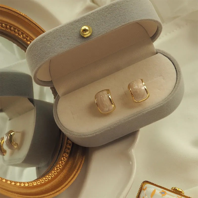 Trending creamy gold studs for women Colour:- Same as photoAnti tarnish earrings Material:- Copper