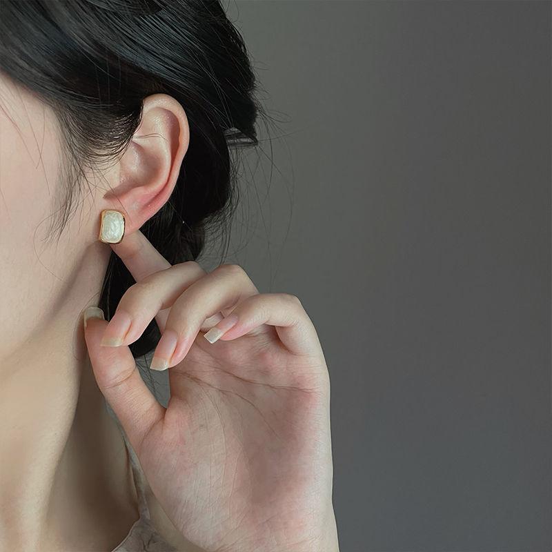 Trending creamy gold studs for women Colour:- Same as photoAnti tarnish earrings Material:- Copper