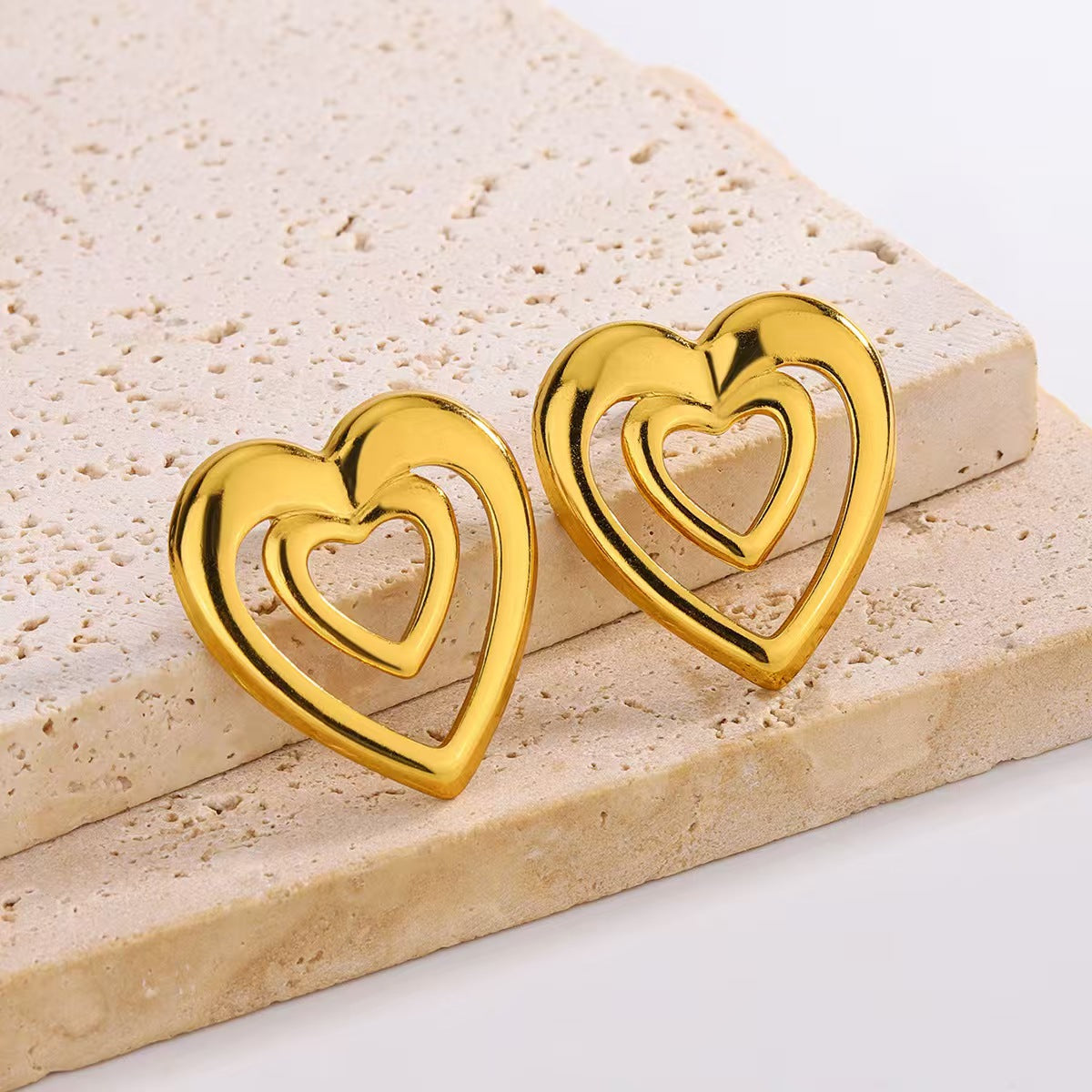Stainless steel Double Heart earrings Colour:- Gold 18 k gold plated steelAnti tarnish and Anti Allergic