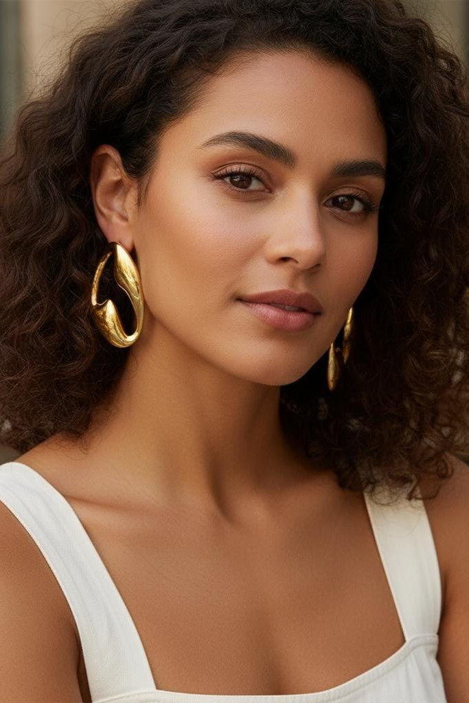 Stainless steel Earrings for women Anti tarnish and Anti Allergic Colour:- Gold 18 k gold plated with superior Quality