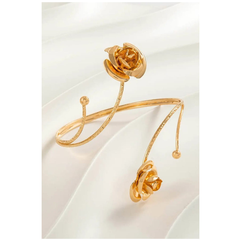 Flower shape Armlet for girls Colour:- GoldAnti tarnish material Anti allergic Material:- Copper Alloy