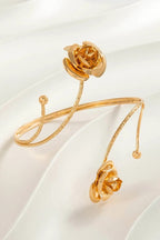 Flower shape Armlet for girls Colour:- GoldAnti tarnish material Anti allergic Material:- Copper Alloy
