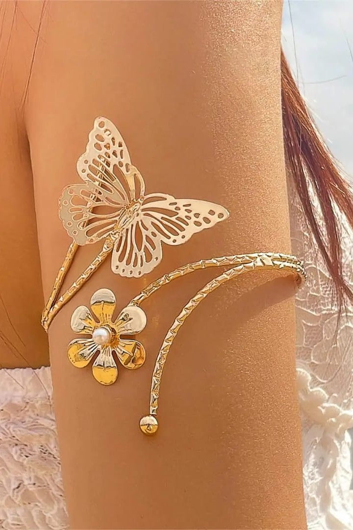Butterfly/ Flower shaped Armlets Colour:- Gold Material:- Copper Alloy Anti tarnish and Anti Allergic Superior Quality products