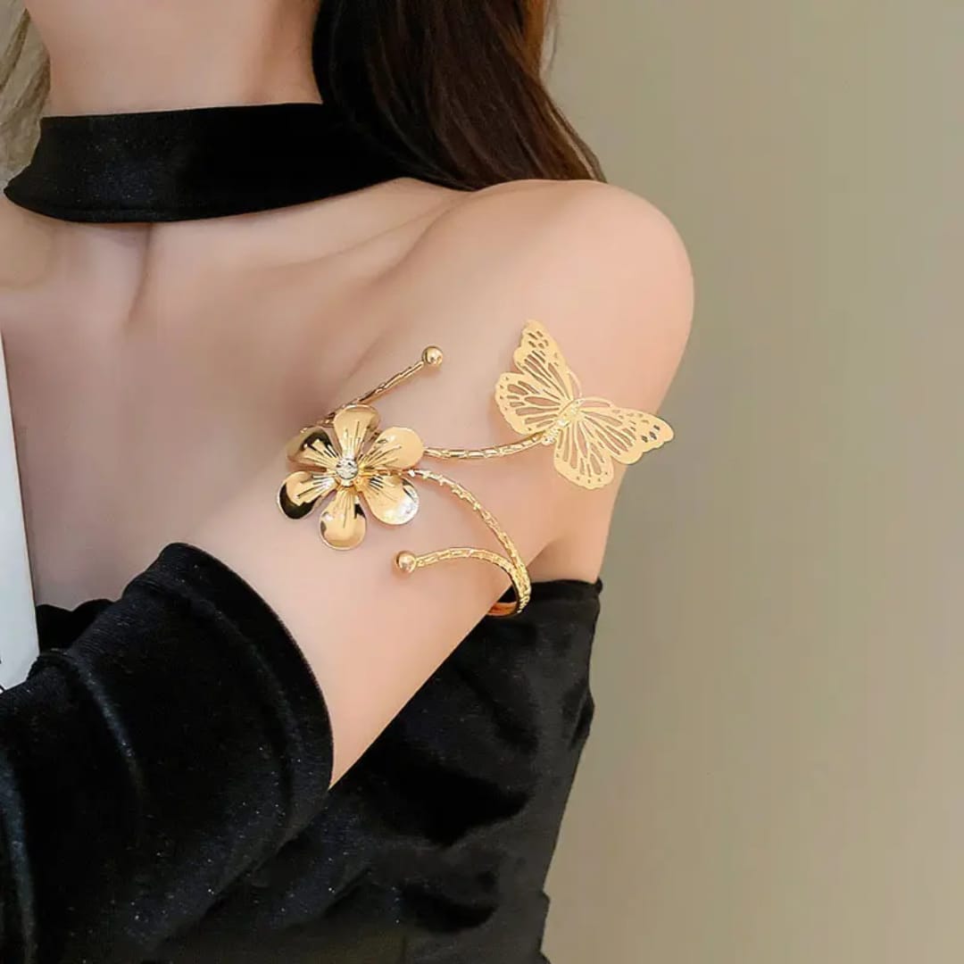Butterfly/ Flower shaped Armlets Colour:- Gold Material:- Copper Alloy Anti tarnish and Anti Allergic Superior Quality products