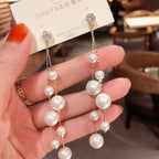 Long tassel pearl stone EarringsMaterial:- Alloy+ Pearls + StonesColor:- Gold