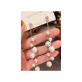 Long tassel pearl stone EarringsMaterial:- Alloy+ Pearls + StonesColor:- Gold