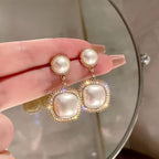 Korean Pearl Rhinestones Earrings for womenMaterial:- Rhinestones+ Pearl + AlloyColor:- Gold