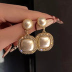 Korean Pearl Rhinestones Earrings for womenMaterial:- Rhinestones+ Pearl + AlloyColor:- Gold