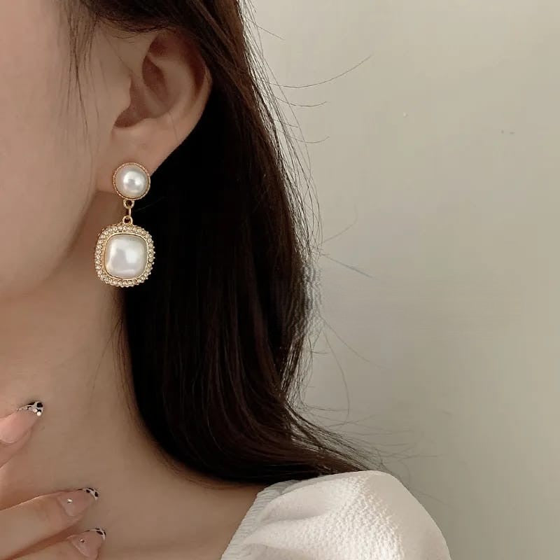 Korean Pearl Rhinestones Earrings for womenMaterial:- Rhinestones+ Pearl + AlloyColor:- Gold