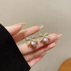 Women's Bow and Pearl Combination Ear studsMaterial:- Pearl + AlloyColor:- Gold
