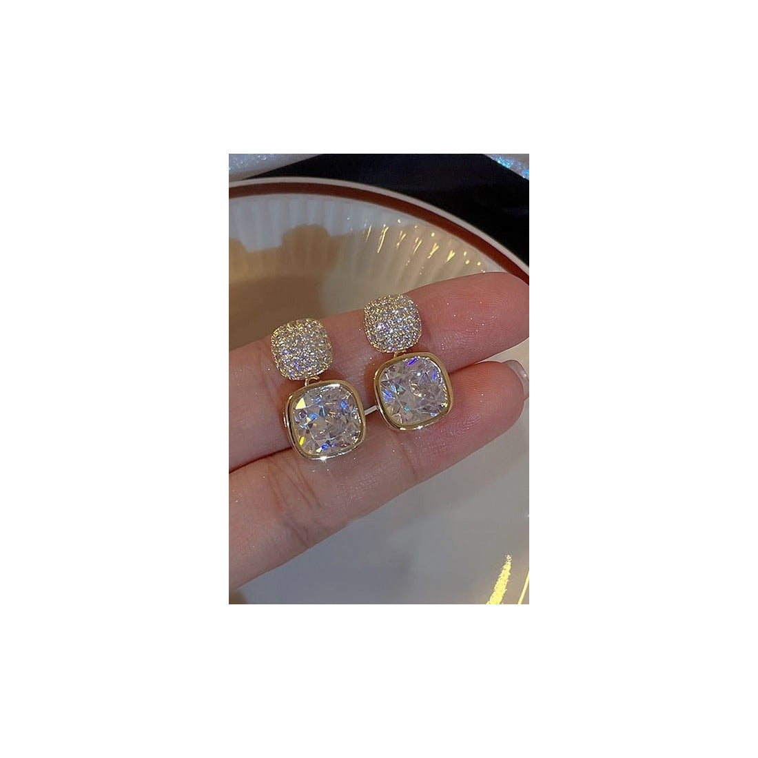 Luxury style Crystal Earrings Material:- Copper + Crystal Colour:- GoldAnti Tarnish products