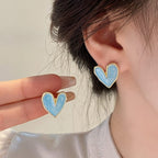 Heart shape Studs for womenAnti tarnish materialColour:- Blue and purpleMaterial:- Alloy Zinc