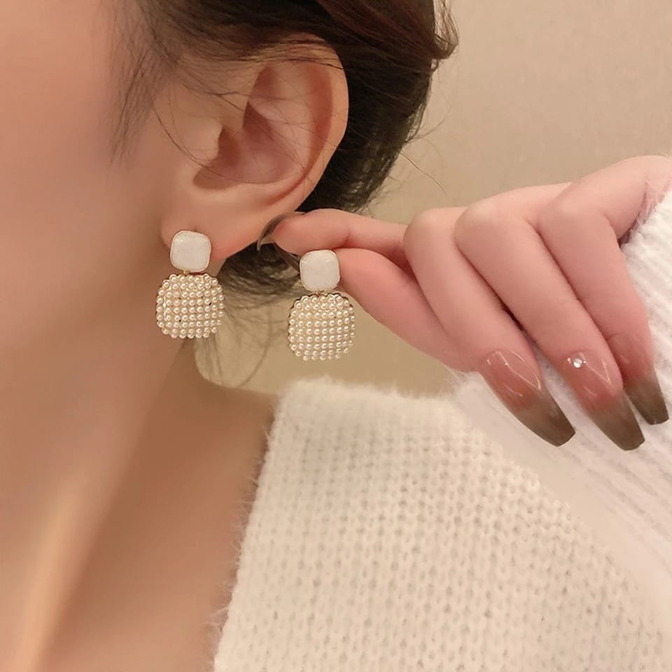 Handmade pearl Earrings for womenAnti tarnish featuresMaterial:- Pearl + Alloy zincColour:- Gold