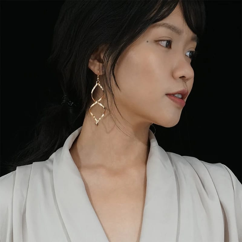 Wave dangle shape Earrings for women Material:- Alloy Zinc