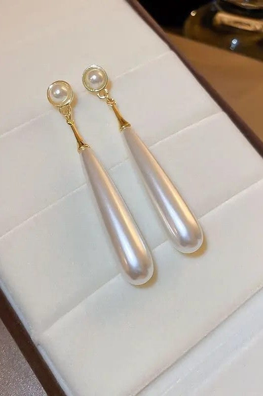 Long pearl Earrings for women Colour:- Same as photo Material:- Alloy + pearl