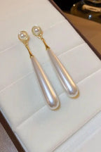 Long pearl Earrings for women Colour:- Same as photo Material:- Alloy + pearl
