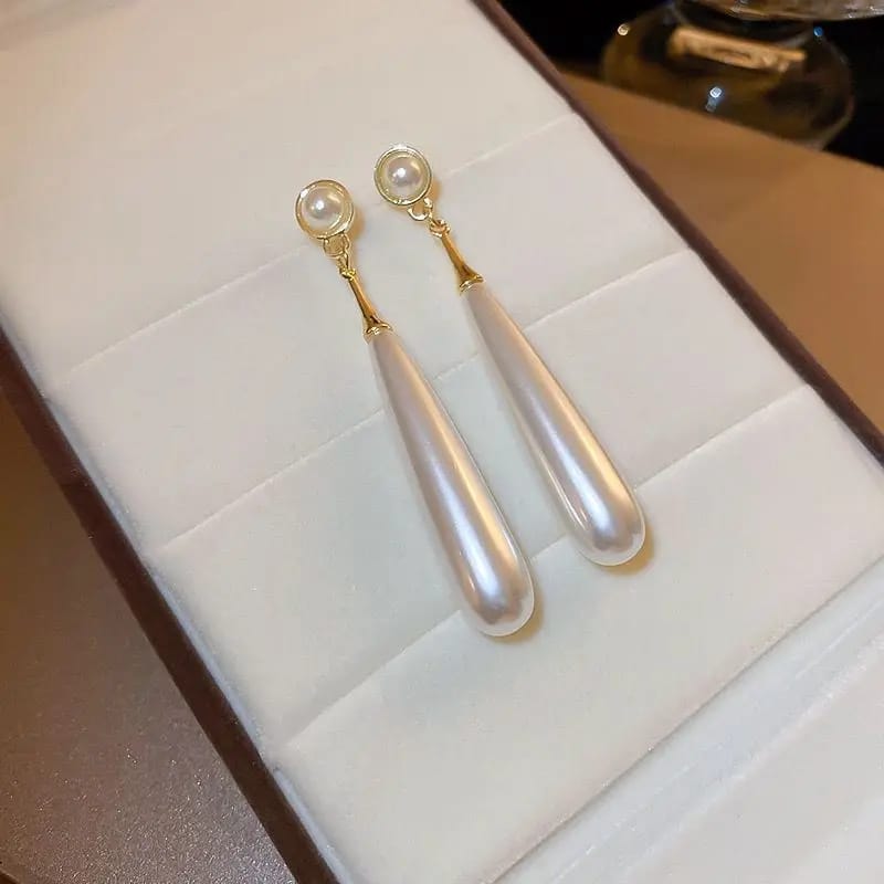 Long pearl Earrings for women Colour:- Same as photo Material:- Alloy + pearl