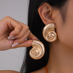 Snail shape oversized Earrings for women Material:- Copper and Gold Electroplating Size :- 4.3 cm Anti Tarnish earrings