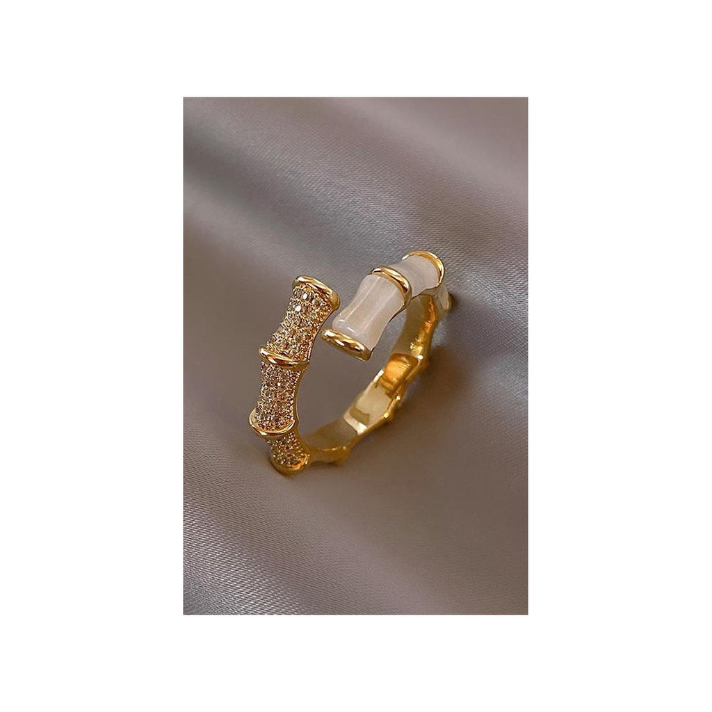 Party wear Adjustable Finger ring for womenMaterial:- Zircon and AlloyColour:- Gold