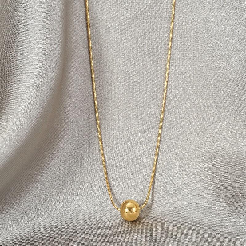 Classic simple ball pendant necklaceMaterial:- Alloy coperColor :- Gold
