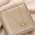 Classic simple ball pendant necklaceMaterial:- Alloy coperColor :- Gold
