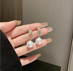 Pearl earrings for women Color :- Same as photo Material:- Alloy copper