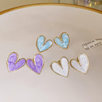 Heart shape Studs for womenAnti tarnish materialColour:- Blue and purpleMaterial:- Alloy Zinc