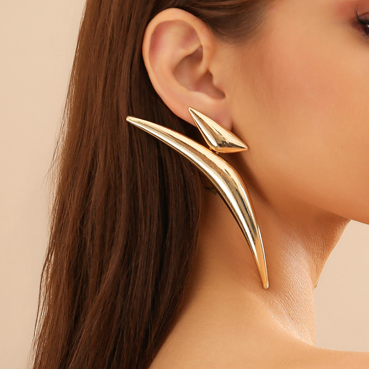 Triangle shape oversized big earrings for women Colour:- GoldMaterial:- Zinc Electroplating